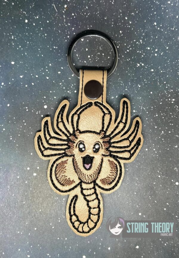 Chibi Face Hugger Snap Tab Key Fob