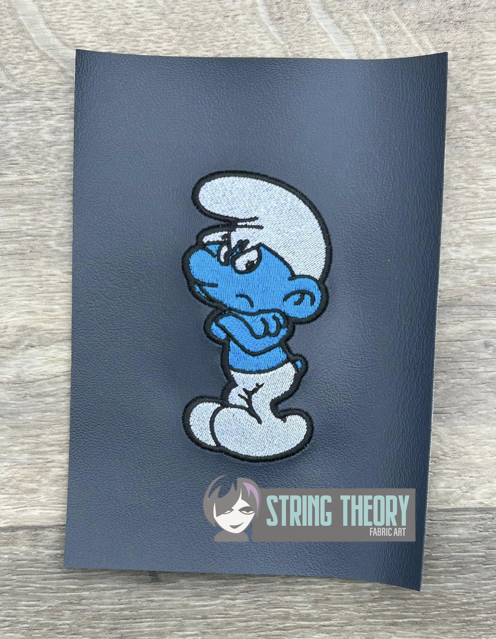 The smurfs Grouchy Smurf machine embroidery design