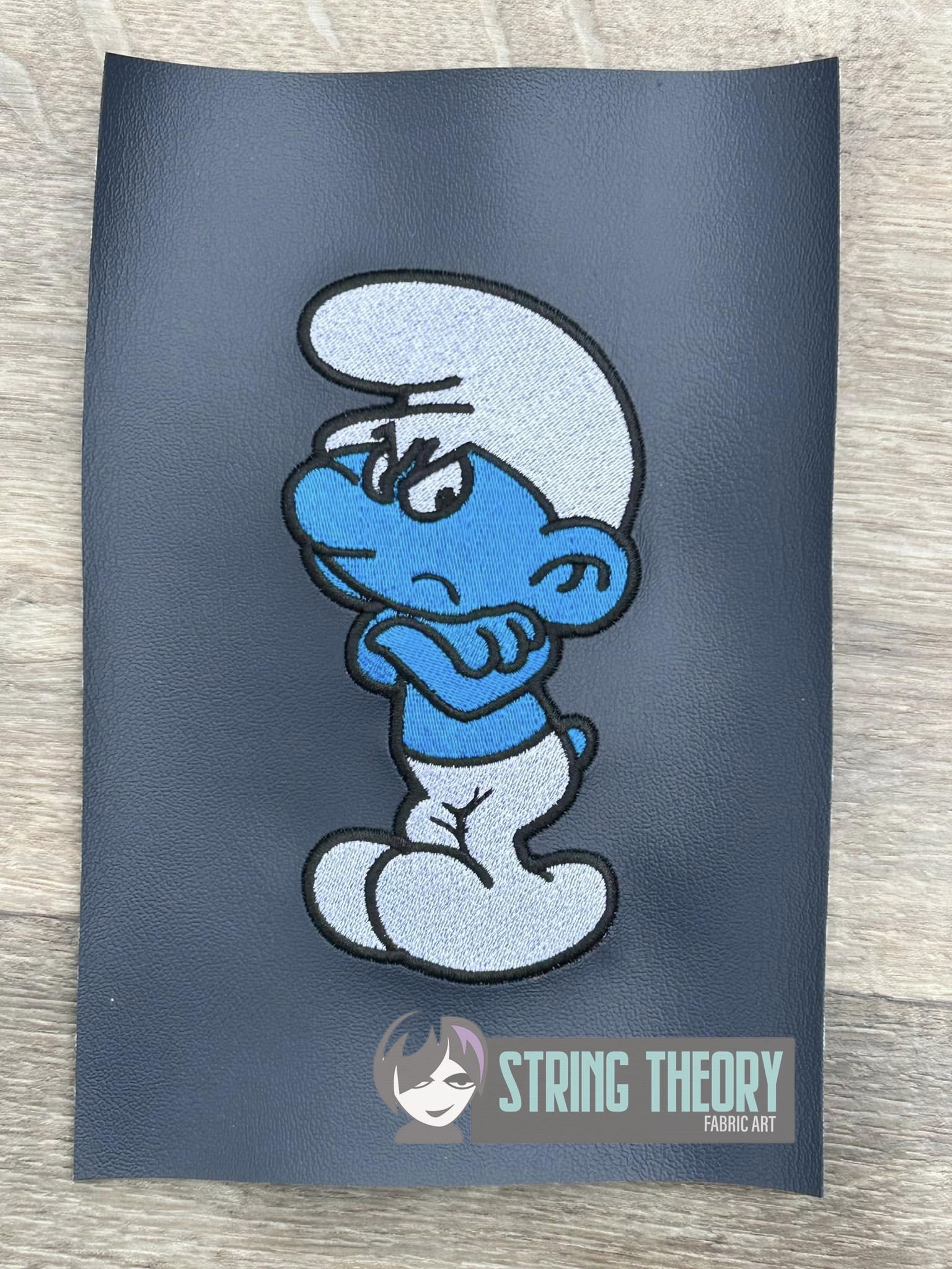 The smurfs Grouchy Smurf machine embroidery design