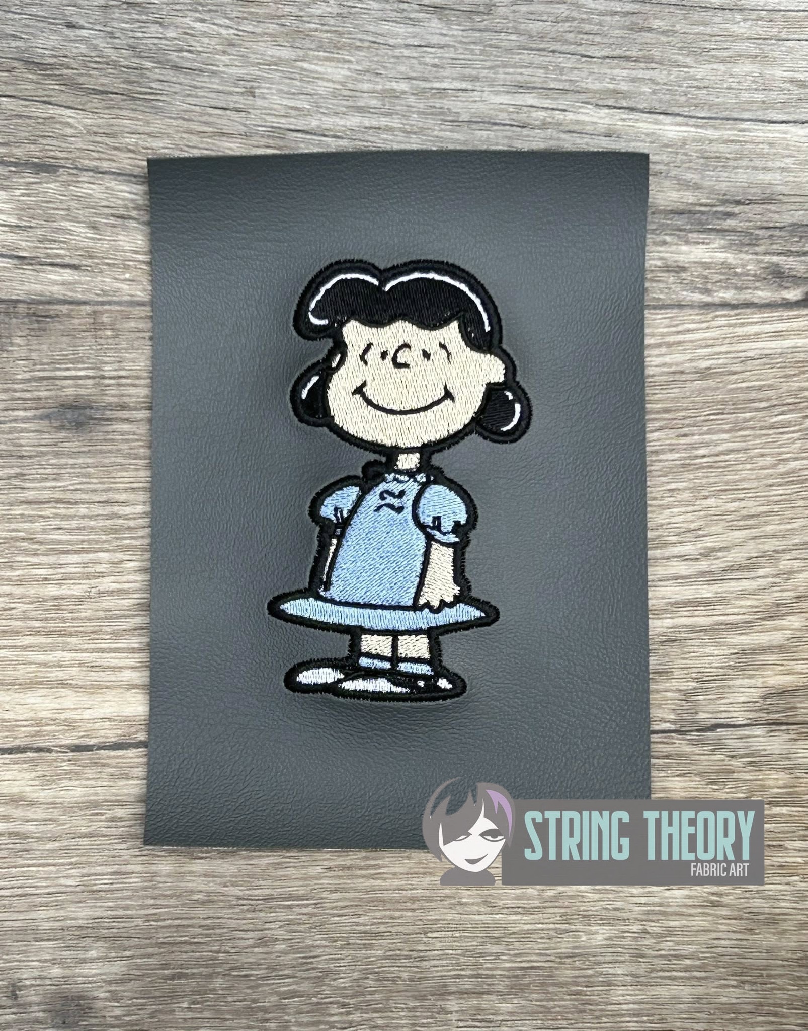 Peanuts Lucy Van Pelt machine embroidery design