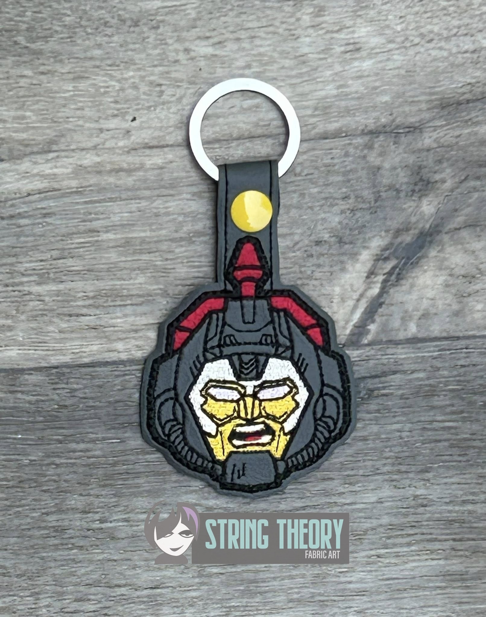 Transformers Omega Supreme ITH fob machine embroidery design