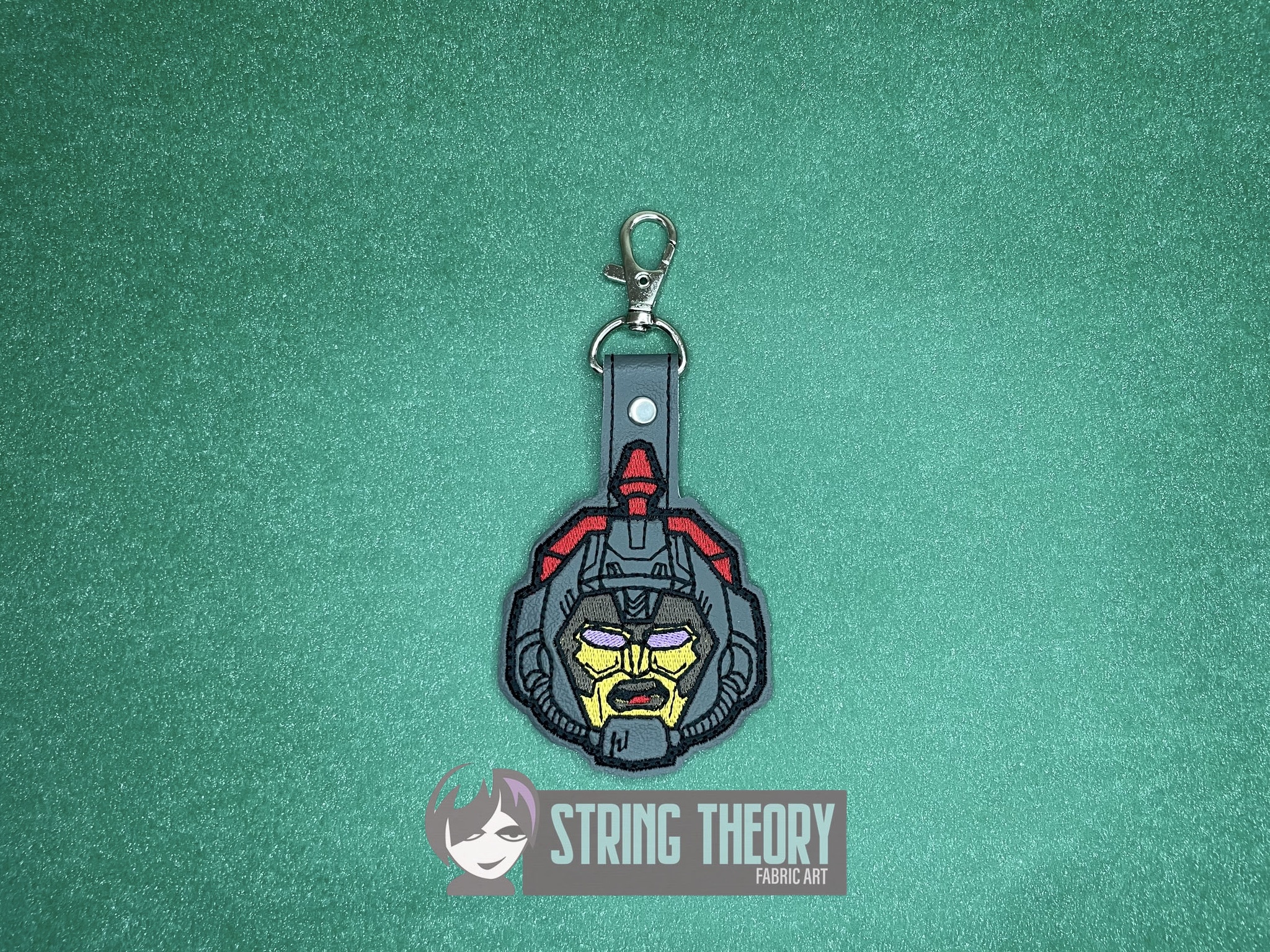 Transformers Omega Supreme ITH fob machine embroidery design