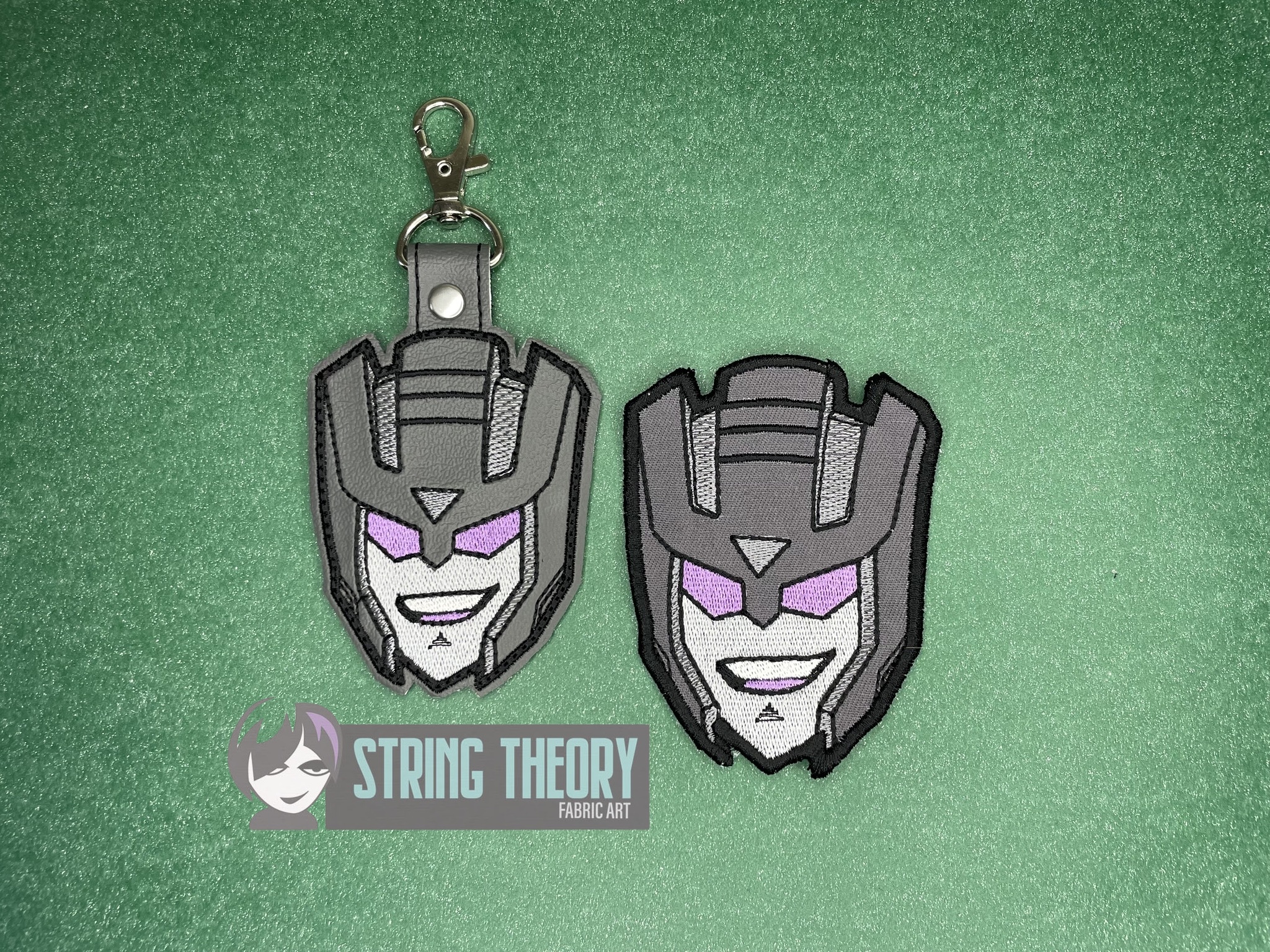 Transformers Swindle ITH fob patch machine embroidery design