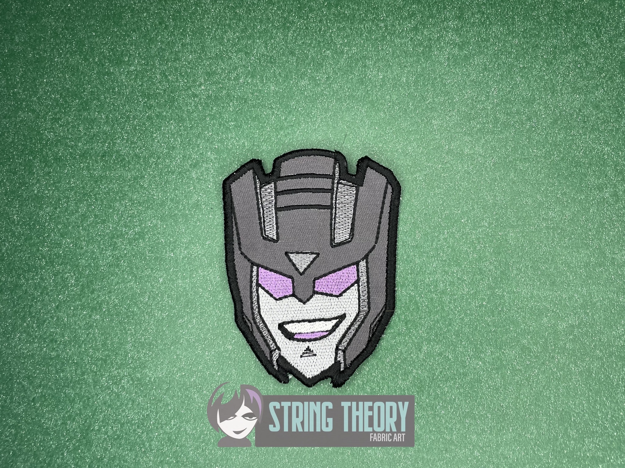Transformers Swindle ITH patch machine embroidery design