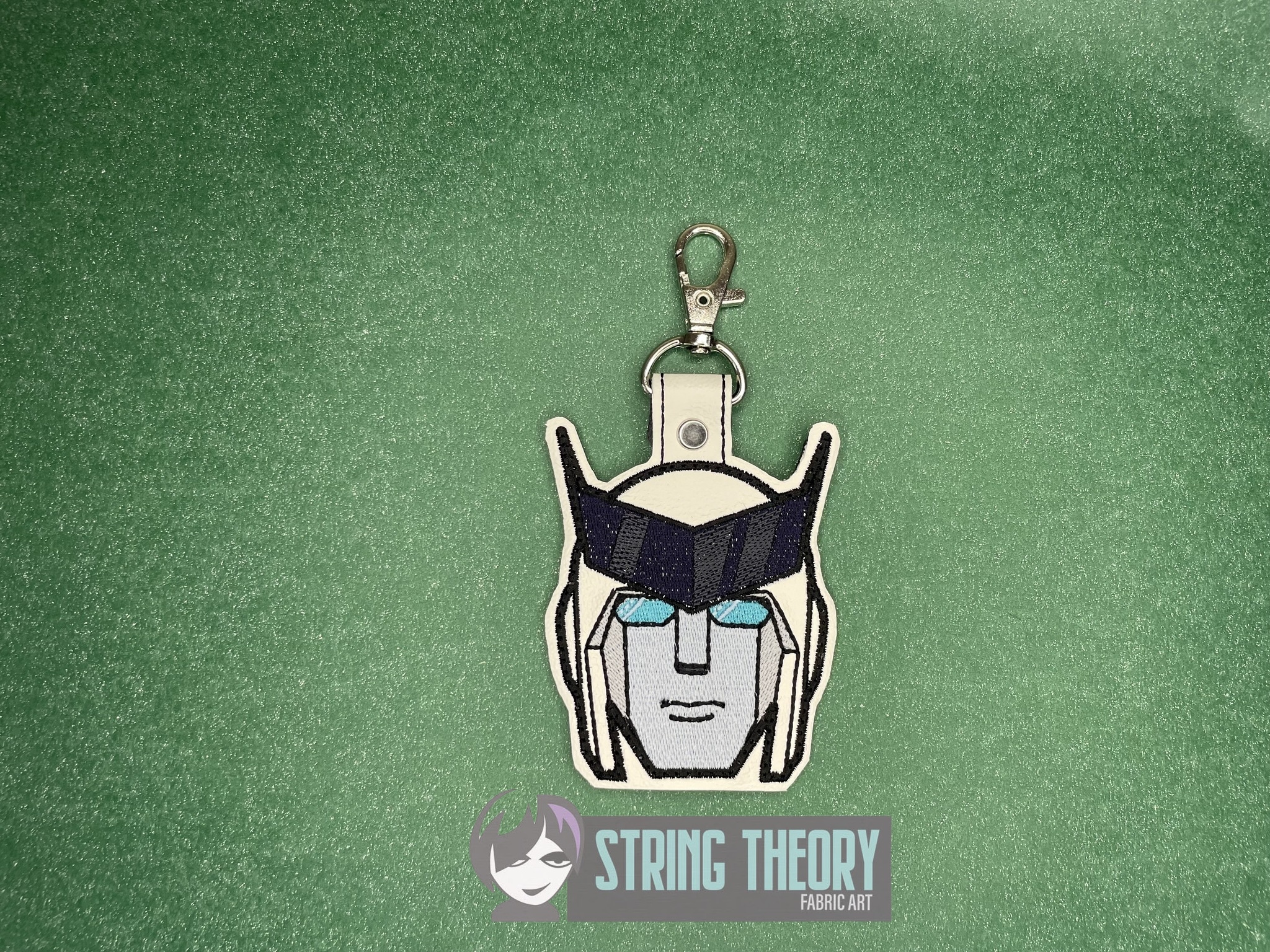 Transformers Ratchet ITH fob machine embroidery design