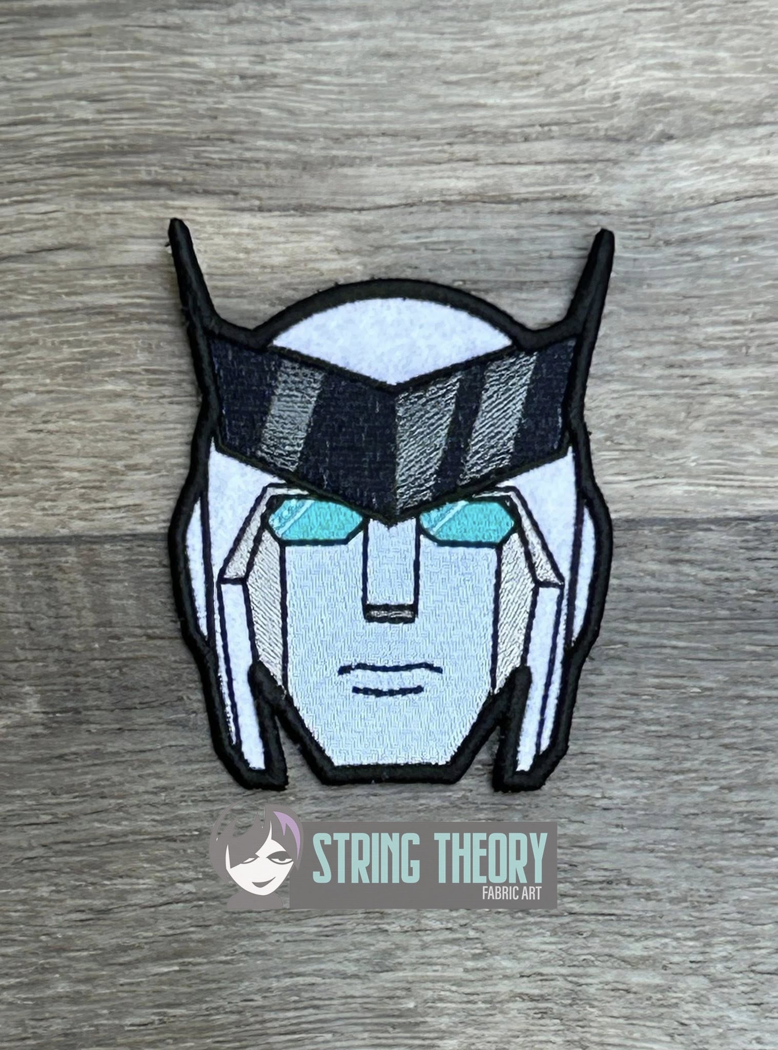 Transformers Ratchet ITH patch machine embroidery design