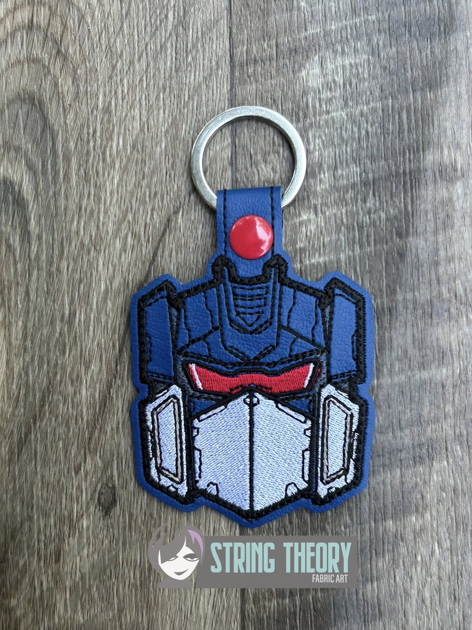 Transformers Soundwave ITH fob machine embroidery design